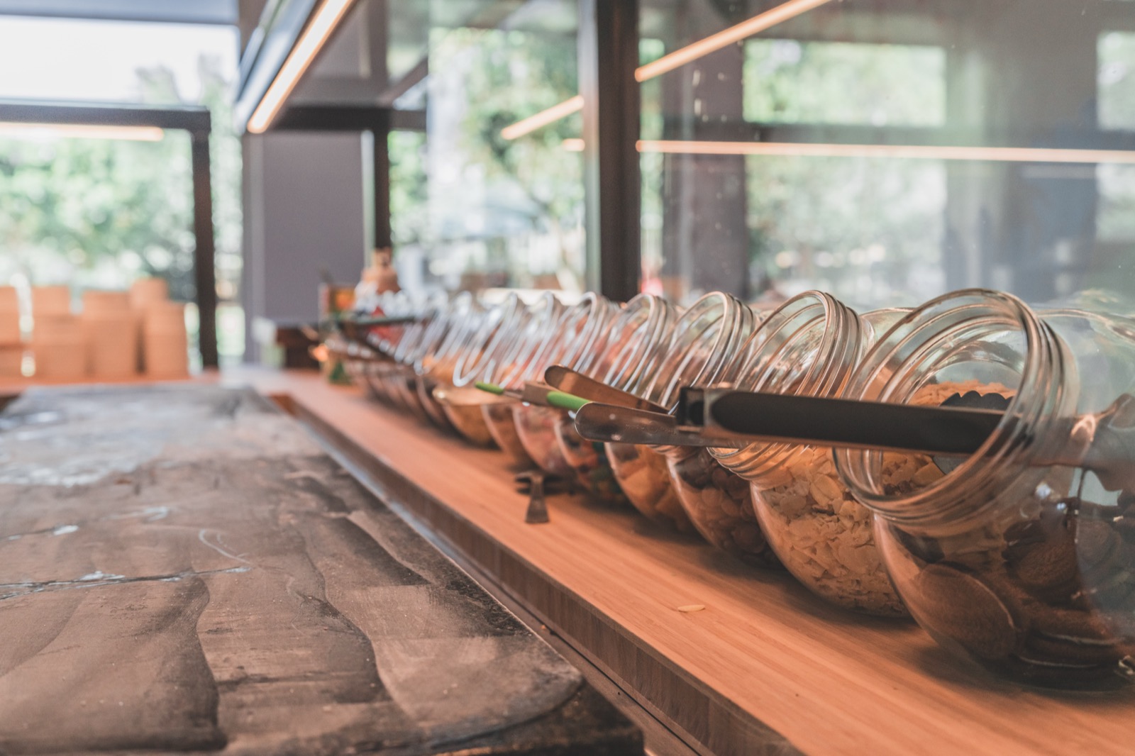 Topping jars lined up on the counter